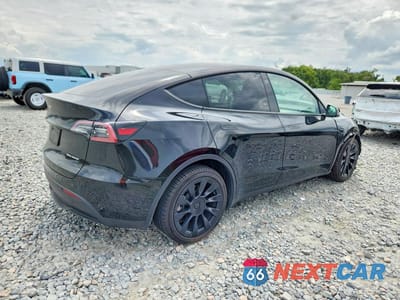 Trzecie zdjęcie samochodu z tyłu: 2023 TESLA MODEL Y VIN:7SAYGAEE9PF767014 - miniatura