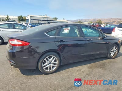 Trzecie zdjęcie samochodu z tyłu: 2016 FORD FUSION SE VIN:3FA6P0H79GR116286 - miniatura