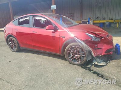 Czwarte zdjęcie samochodu z boku: 2024 TESLA MODEL Y VIN:7SAYGDEE0RF065930 - miniatura