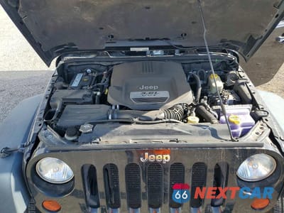 Zdjęcie 11 z 13 samochodu: 2013 JEEP WRANGLER SPORT VIN:1C4GJWAG9DL660164 - miniatura