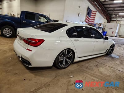 Trzecie zdjęcie samochodu z tyłu: 2017 BMW 740 I VIN:WBA7E2C39HG740616 - miniatura