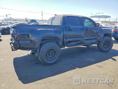 Trzecie zdjęcie samochodu z tyłu: 2023 TOYOTA TACOMA TRD PRO VIN:3TYCZ5AN7PT148152 - miniatura