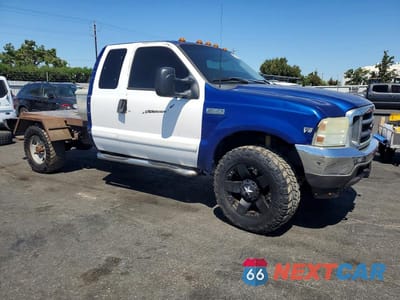 Czwarte zdjęcie samochodu z boku: 1999 FORD F350 SRW SUPER DUTY VIN:1FTSX31F4XEA41365 - miniatura