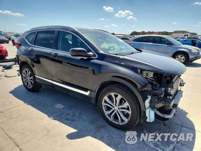 Czwarte zdjęcie samochodu z boku: 2020 HONDA CR-V TOURING VIN:2HKRW2H9XLH663622 - miniatura