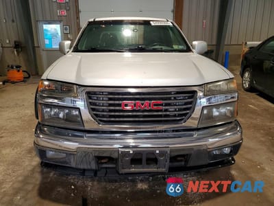 Piąte zdjęcie samochodu w środku: 2011 GMC CANYON SLE VIN:1GTH6MFE3B8128636 - miniatura