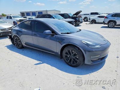 Czwarte zdjęcie samochodu z boku: 2023 TESLA MODEL 3 VIN:5YJ3E1EA3PF421986 - miniatura