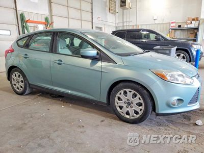 Czwarte zdjęcie samochodu z boku: 2012 FORD FOCUS SE VIN:1FAHP3K22CL461854 - miniatura