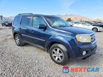 Czwarte zdjęcie samochodu z boku: 2011 HONDA PILOT TOURING VIN:5FNYF4H95BB090066 - miniatura