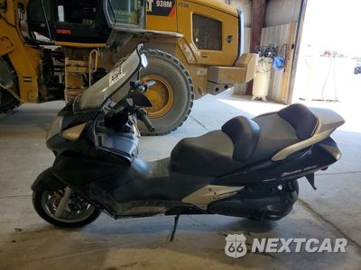 Trzecie zdjęcie samochodu z tyłu: 2013 HONDA FSC600 A VIN:JH2PF0147DK100239 - miniatura