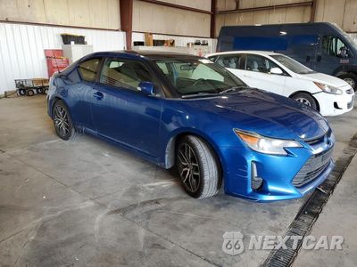 Czwarte zdjęcie samochodu z boku: 2014 SCION TC BASE VIN:JTKJF5C70E3082027 - miniatura
