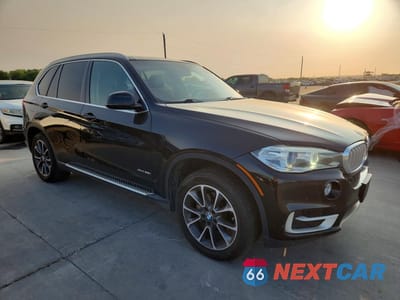 Czwarte zdjęcie samochodu z boku: 2015 BMW X5 XDRIVE35I VIN:5UXKR0C53F0K71566 - miniatura