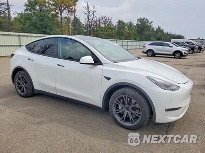 Czwarte zdjęcie samochodu z boku: 2024 TESLA MODEL Y VIN:7SAYGDEE8RF159831 - miniatura
