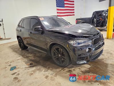 Czwarte zdjęcie samochodu z boku: 2018 BMW X5 M VIN:5YMKT6C56J0X21328 - miniatura