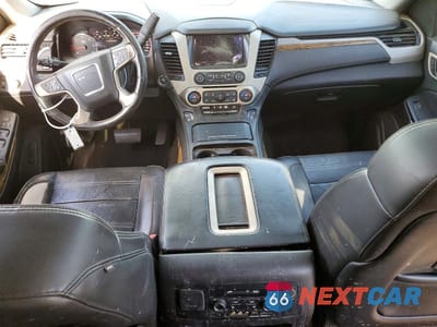 Zdjęcie 8 z 13 samochodu: 2015 GMC YUKON DENALI VIN:1GKS1CKJ3FR261189 - miniatura
