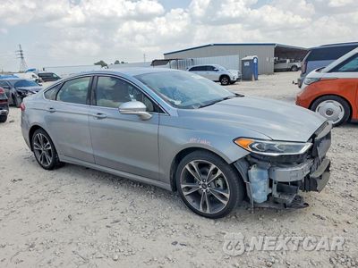 Czwarte zdjęcie samochodu z boku: 2020 FORD FUSION TITANIUM VIN:3FA6P0K93LR174575 - miniatura