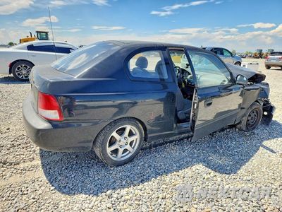 Trzecie zdjęcie samochodu z tyłu: 2002 HYUNDAI ACCENT L VIN:KMHCF35G02U217011 - miniatura