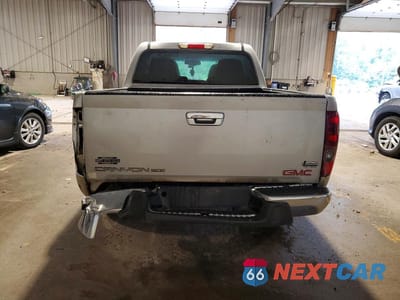 Zdjęcie 6 z 12 samochodu: 2011 GMC CANYON SLE VIN:1GTH6MFE3B8128636 - miniatura
