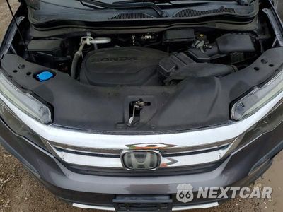 Zdjęcie 12 z 13 samochodu: 2020 HONDA PILOT EXL VIN:5FNYF5H57LB014837 - miniatura