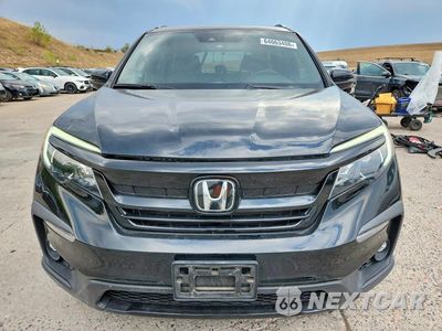 Piąte zdjęcie samochodu w środku: 2022 HONDA PILOT TRAILSPORT VIN:5FNYF6H8XNB062111 - miniatura