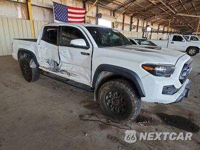 Czwarte zdjęcie samochodu z boku: 2019 TOYOTA TACOMA TRD PRO VIN:5TFCZ5AN7KX194434 - miniatura