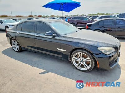 Czwarte zdjęcie samochodu z boku: 2014 BMW 750 LXI VIN:WBAYF8C58ED142486 - miniatura