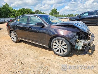 Czwarte zdjęcie samochodu z boku: 2014 LINCOLN MKS VIN:1LNHL9DK0EG604877 - miniatura