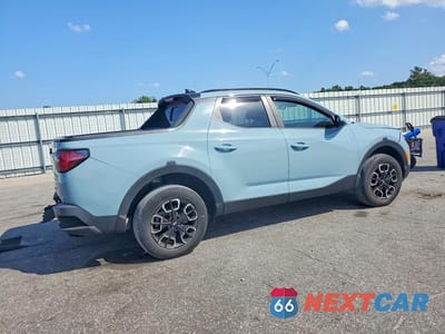 Trzecie zdjęcie samochodu z tyłu: 2023 HYUNDAI SANTA CRUZ SEL PREMIUM VIN:5NTJDDAF3PH043748 - miniatura