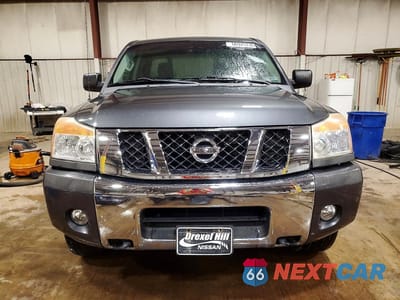 Piąte zdjęcie samochodu w środku: 2012 NISSAN TITAN SV VIN:1N6AA0ECXCN314294 - miniatura