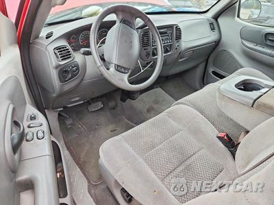 Zdjęcie 8 z 12 samochodu: 2002 FORD F150 VIN:1FTRX18L92KA55772 - miniatura