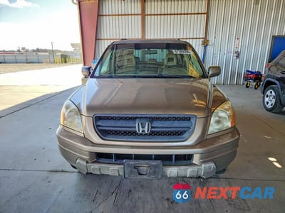 Piąte zdjęcie samochodu w środku: 2004 HONDA PILOT EXL VIN:2HKYF18504H518707 - miniatura