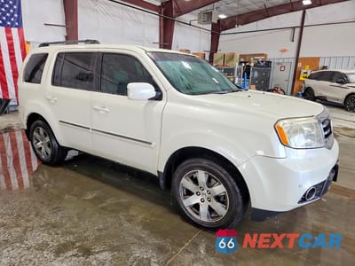 Czwarte zdjęcie samochodu z boku: 2015 HONDA PILOT TOURING VIN:5FNYF4H94FB044203 - miniatura