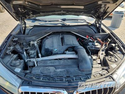 Zdjęcie 11 z 12 samochodu: 2014 BMW X5 XDRIVE35I VIN:5UXKR0C5XE0H19609 - miniatura