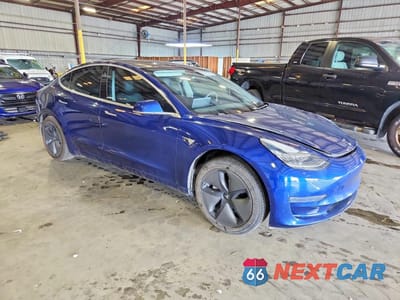 Czwarte zdjęcie samochodu z boku: 2020 TESLA MODEL 3 VIN:5YJ3E1EA8LF631090 - miniatura