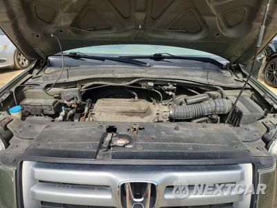 Zdjęcie 12 z 13 samochodu: 2006 HONDA PILOT EX VIN:2HKYF18686H523598 - miniatura