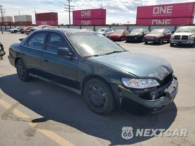 Czwarte zdjęcie samochodu z boku: 1999 HONDA ACCORD LX VIN:JHMCG5642XC035937 - miniatura