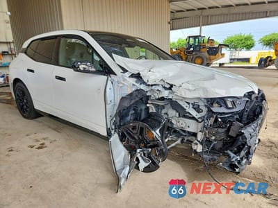 Czwarte zdjęcie samochodu z boku: 2026 BMW IX XDRIVE60 VIN:WB553CF04TCV07276 - miniatura