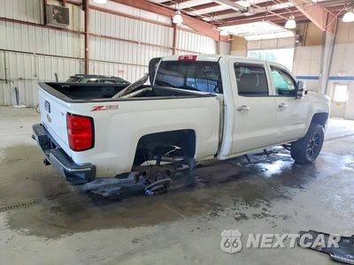 Trzecie zdjęcie samochodu z tyłu: 2014 CHEVROLET SILVERADO K1500 LT VIN:3GCUKREC2EG384711 - miniatura
