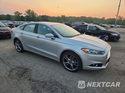 Czwarte zdjęcie samochodu z boku: 2014 FORD FUSION TITANIUM VIN:3FA6P0D90ER310953 - miniatura