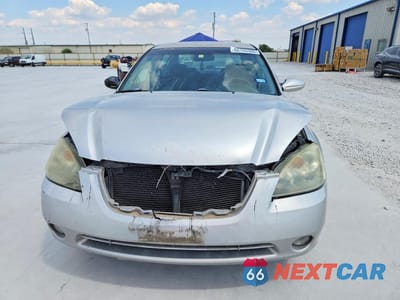 Piąte zdjęcie samochodu w środku: 2003 NISSAN ALTIMA 3.5 SE VIN:1N4BL11D43C268419 - miniatura