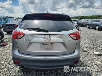 Zdjęcie 6 z 13 samochodu: 2013 MAZDA CX-5 GT VIN:JM3KE2DE0D0140400 - miniatura