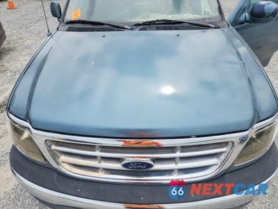 Zdjęcie 11 z 12 samochodu: 1999 FORD F150 VIN:1FTZF1729XNA68877 - miniatura