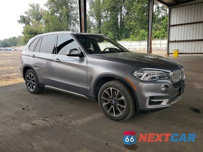 Czwarte zdjęcie samochodu z boku: 2018 BMW X5 XDR40E VIN:5UXKT0C56J0W00755 - miniatura