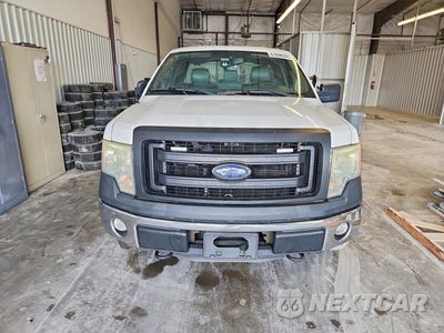 Piąte zdjęcie samochodu w środku: 2014 FORD F150 VIN:1FTMF1EF2EKG10027 - miniatura