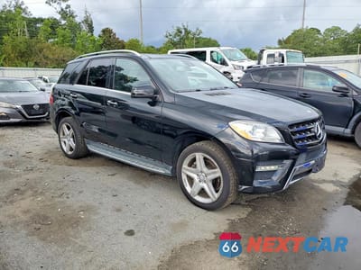 Czwarte zdjęcie samochodu z boku: 2015 MERCEDES-BENZ ML 400 4MATIC VIN:4JGDA5GB3FA546177 - miniatura