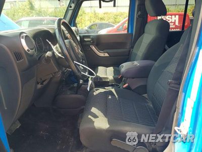 Zdjęcie 7 z 13 samochodu: 2011 JEEP WRANGLER UNLIMITED SAHARA VIN:1J4BA5H17BL641416 - miniatura
