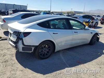 Trzecie zdjęcie samochodu z tyłu: 2023 TESLA MODEL 3 VIN:5YJ3E1EA5PF541840 - miniatura
