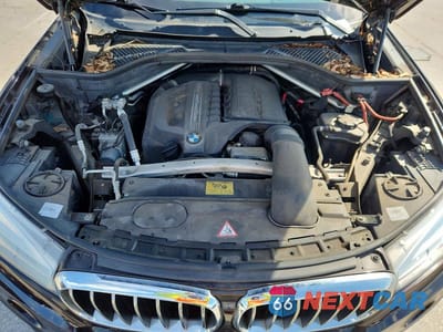 Zdjęcie 12 z 13 samochodu: 2014 BMW X5 XDRIVE35I VIN:5UXKR0C58E0H16949 - miniatura