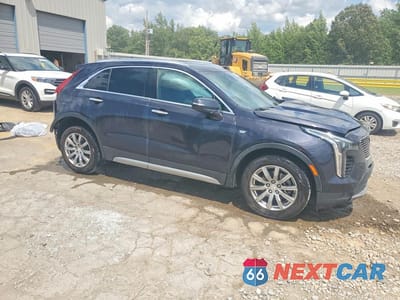 Czwarte zdjęcie samochodu z boku: 2023 CADILLAC XT4 PREMIUM LUXURY VIN:1GYFZCR4XPF170391 - miniatura