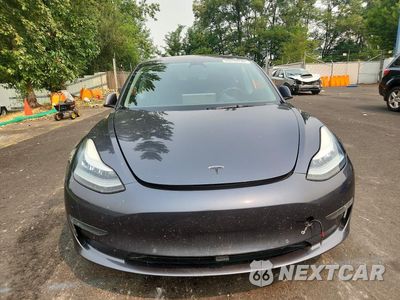 Piąte zdjęcie samochodu w środku: 2018 TESLA MODEL 3 VIN:5YJ3E1EA7JF110181 - miniatura
