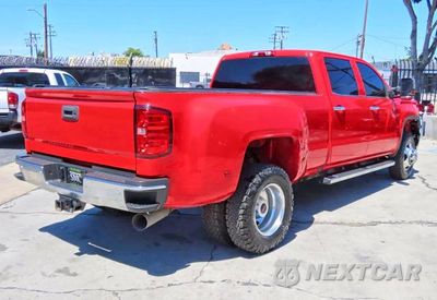Trzecie zdjęcie samochodu z tyłu: 2016 GMC SIERRA K3500 SLT VIN:1GT42XE82GF226308 - miniatura
